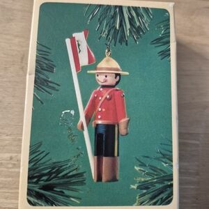 Hallmark Red and Gold Mountie Wooden Ornament